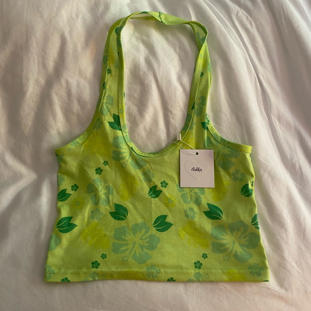 Adika top, never worn in very good condition, with tags